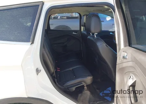 2014 Ford Escape Titanium z USA, uszkodzony, nr VIN 1FMCU0J99EUA91053